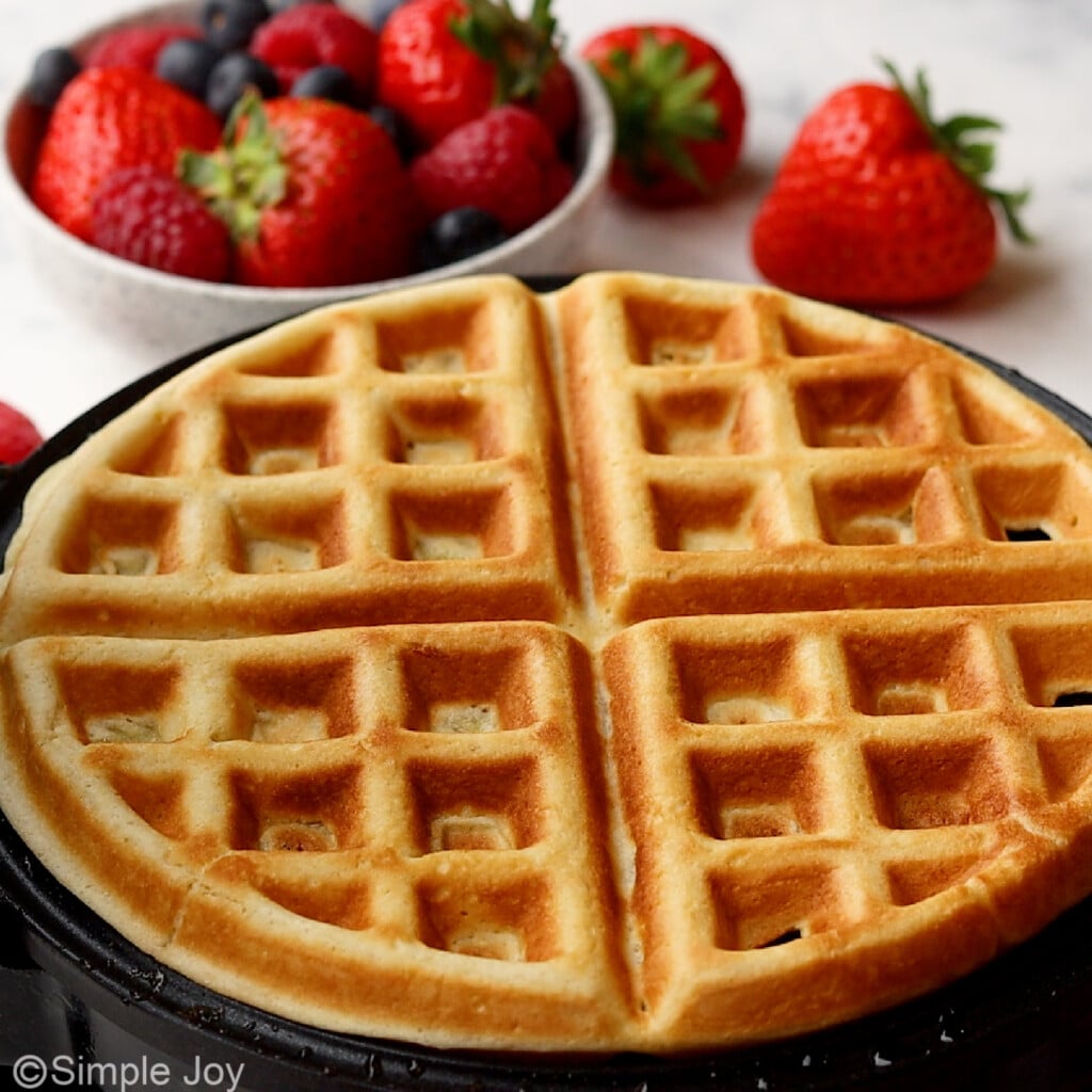 a cooked waffle in a waffle maker