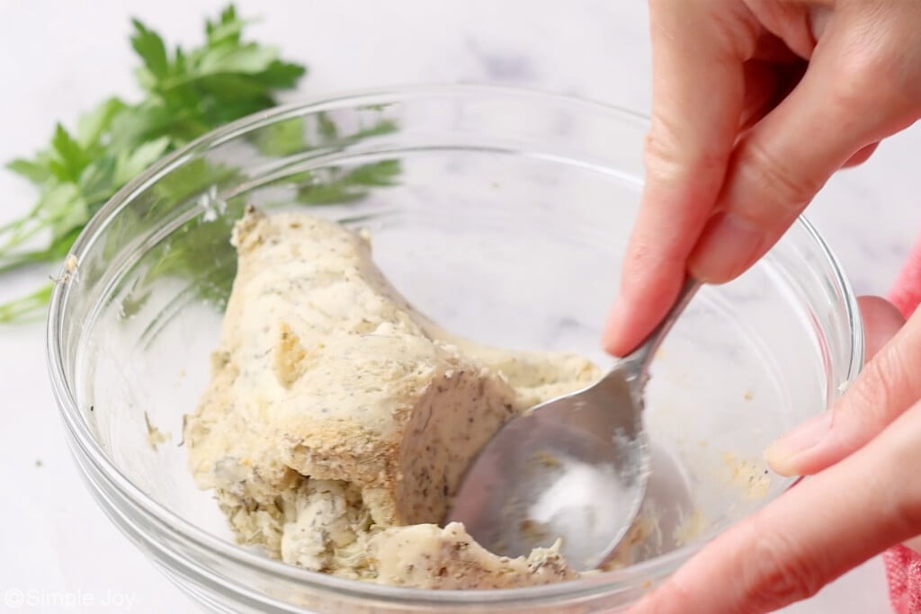 compound butter being mixed together in a small bowl