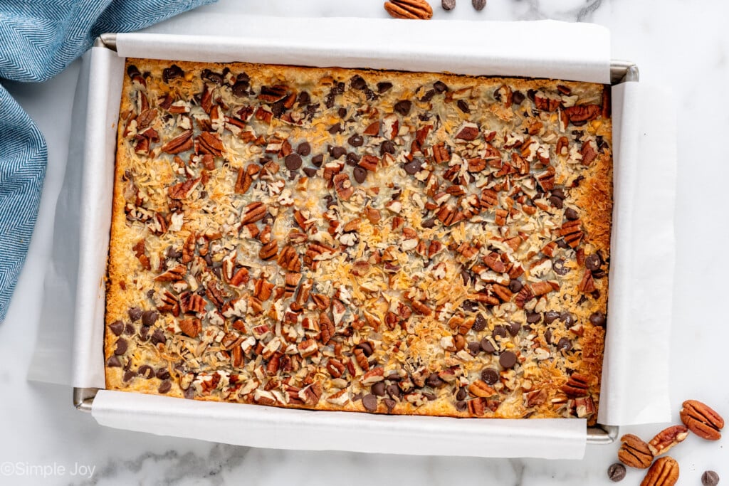 overhead of baked magic bars in a 9 by 13 inch baking dish - 8