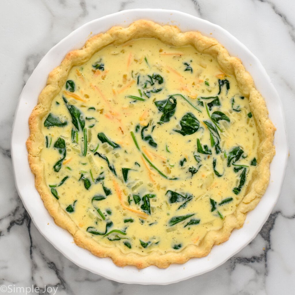 Overhead view of Spinach Quiche recipe before baking.