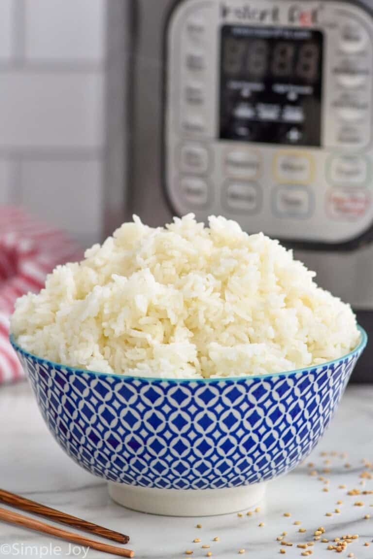 bowl of Instant Pot Rice with instant pot sitting in background