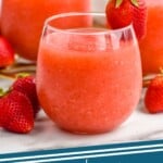 Pinterest graphic for daiquiri strawberry. Image shows three glasses of daiquiri strawberry garnished with a fresh strawberry on the rim. Says "deliciously easy strawberry daiquiri simplejoy.com"