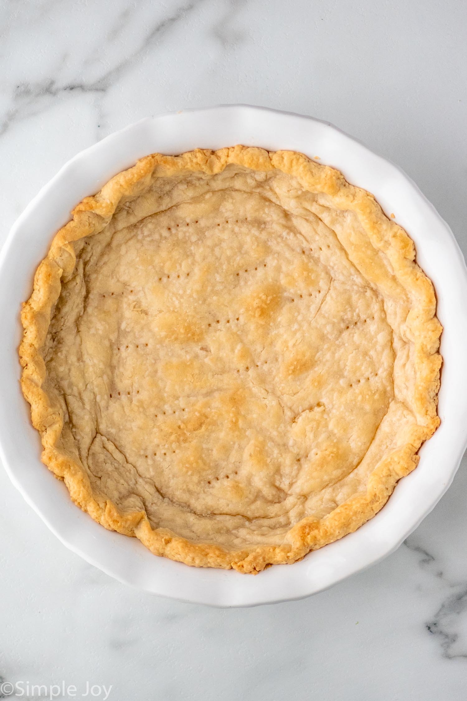 overhead photo of a blind baked pie crust