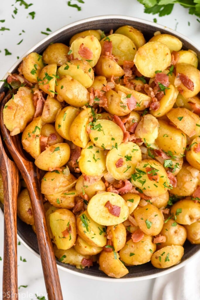 Overhead of bowl of German Potato Salad topped with parsley