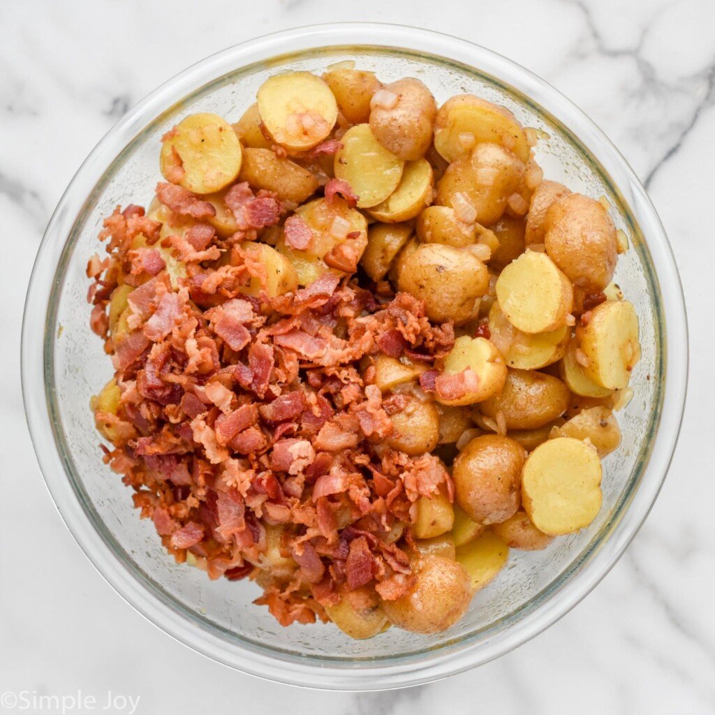 overhead of bowl of German Potato Salad ingredients
