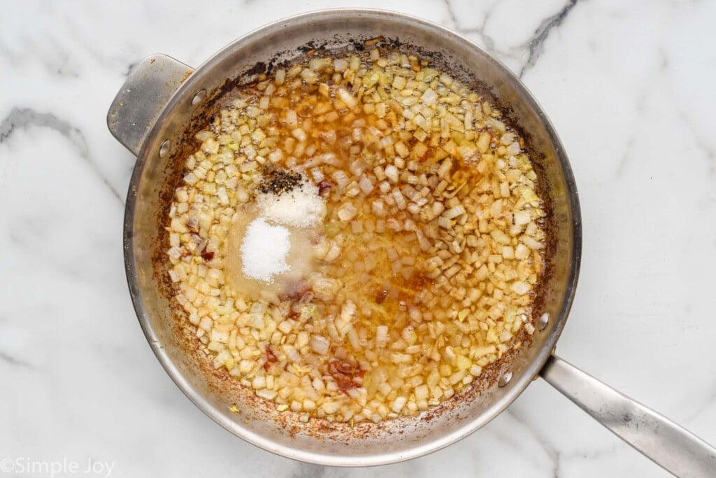 overhead of skillet of German Potato Salad ingredients