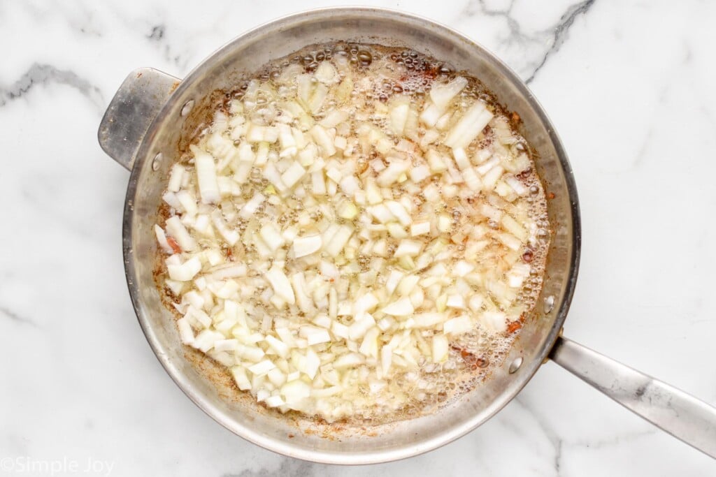 overhead of skillet of German Potato Salad ingredients