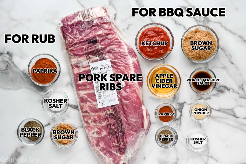 overhead of the ingredients for crock pot ribs with the ingredients labeled