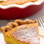 Pinterest graphic for Chess Pie recipe. Text says, "the best Chess Pie recipe simplejoy.com." Image shows a slice of Chess Pie served on a plate with a fork beside.