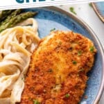 Pinterest graphic for Parmesan Crusted Chicken. Says "the best Parmesan Crusted Chicken simplejoy.com" Image shows a plate of Parmesan Crusted Chicken with pasta and asparagus.