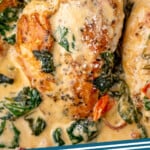 Pinterest graphic for Tuscan Chicken recipe. Image is close up view of Tuscan Chicken. Text says, "Tuscan Chicken simplejoy.com."