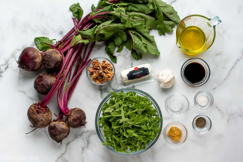 Overhead view of ingredients on countertop for Beet Salad recipe.