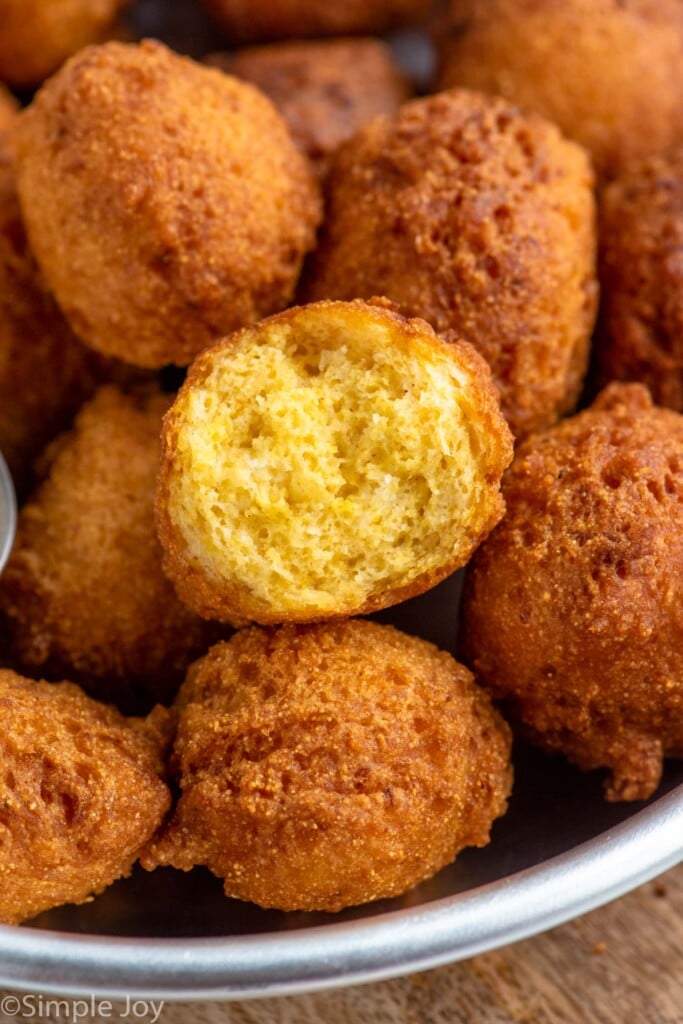 Close up photo of Hush Puppies with one broken in half