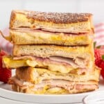 side view of stack of Monte Cristo Sandwiches cut in half