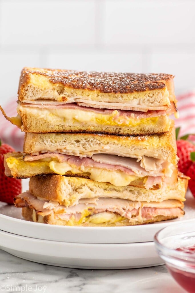side view of stack of Monte Cristo Sandwiches cut in half