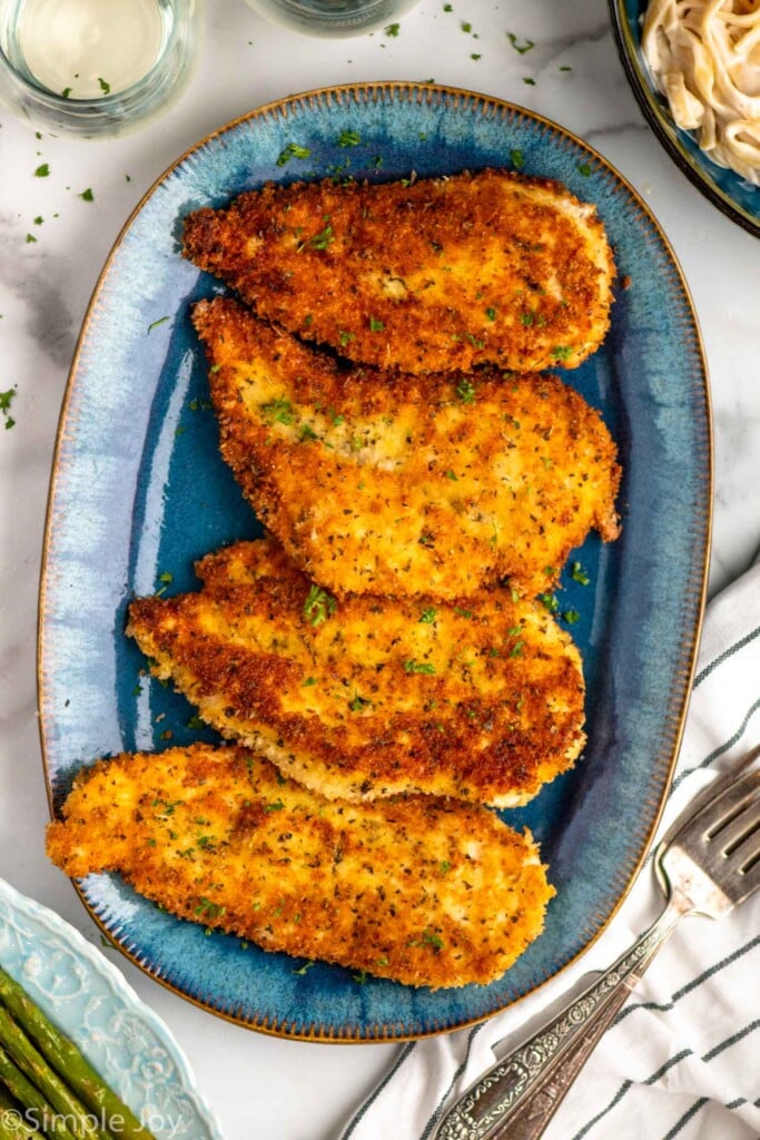 overhead of platter of Parmesan Crusted Chicken