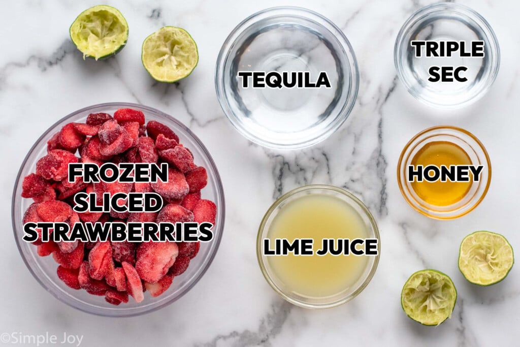 Overhead view of ingredients for Strawberry Margarita recipe on countertop - 4