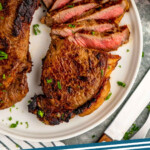 Pinterest graphic for steak marinade recipe. Image shows a sliced steak made with steak marinade recipe. Text says, "steak marinade simplejoy.com"