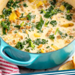 Pinterest graphic for Zuppa Toscana recipe. Pot of Zuppa Toscana with bread beside. Text says, "Zuppa Toscana simplejoy.com."