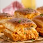 Side view of Buffalo Chicken Sliders on a serving board.