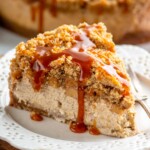 Slice of Caramel Apple Cheesecake garnished with caramel served on a plate with a fork - 18