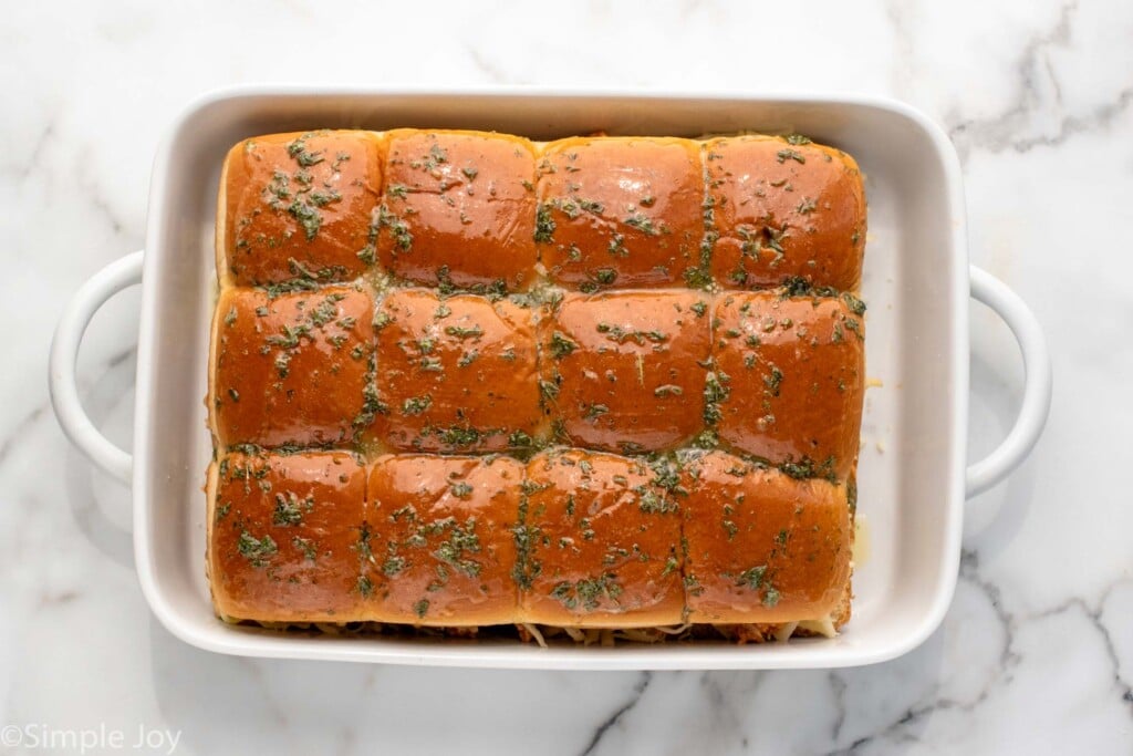 Overhead view of a baking dish of Buffalo Chicken Sliders - 8