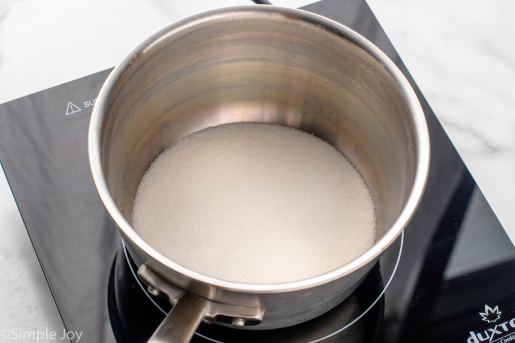 Pot with sugar for caramel sauce recipe - 6