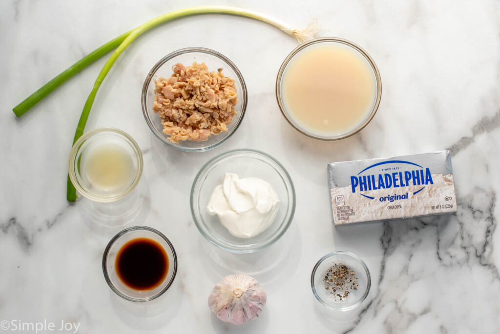 overhead view of ingredients for Clam Dip recipe on countertop - 3