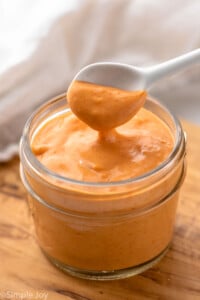 Jar of Sriracha Mayo with a small spoon - 7