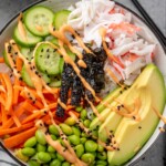 Overhead view of Sushi Bowl garnished with sriracha mayo - 9
