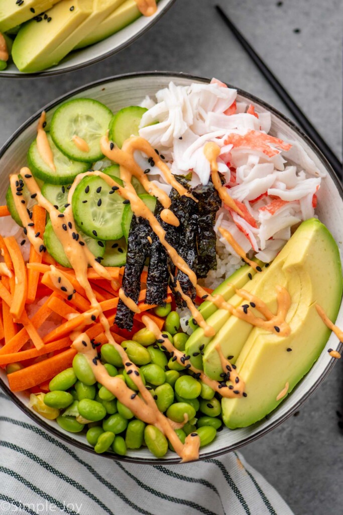 Overhead view of Sushi Bowl garnished with sriracha mayo - 7