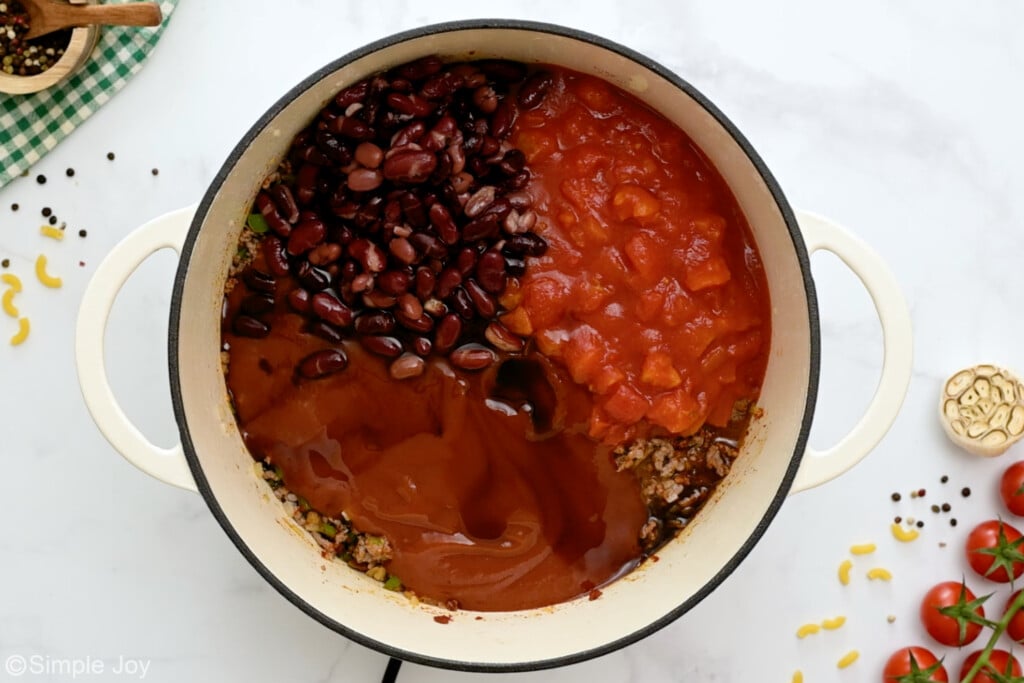 kidney beans, tomato sauce, liquid smoke, Worcestershire sauce, and diced tomatoes added to a large pot - 8