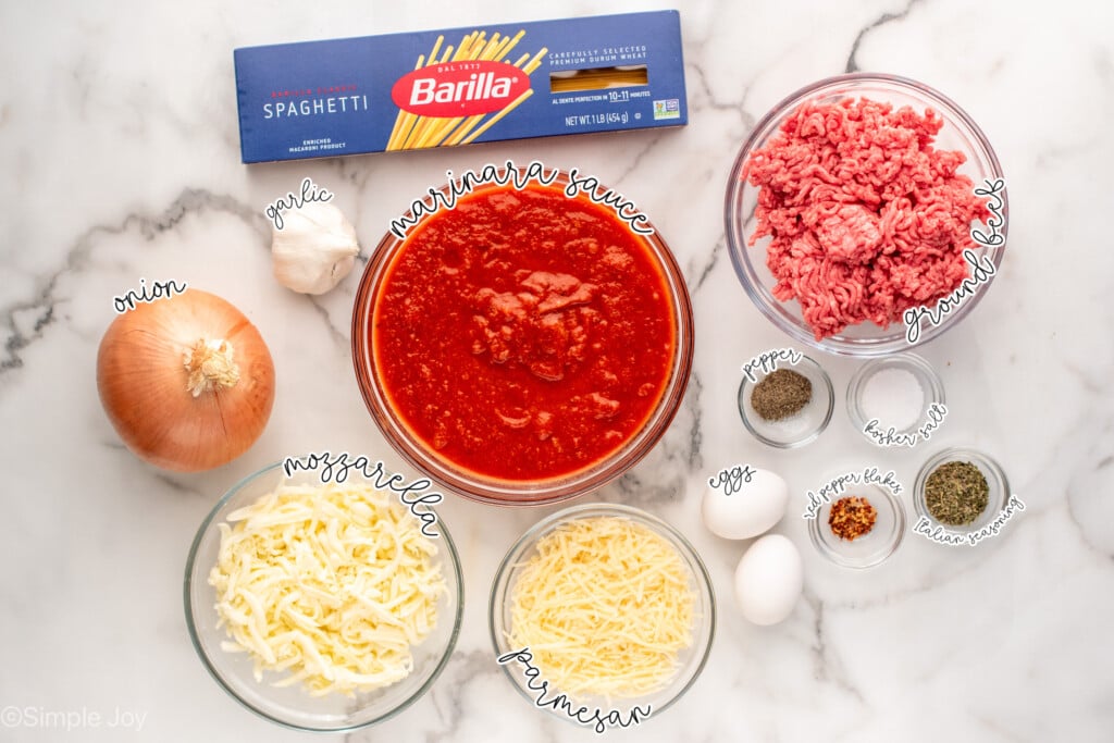 Overhead view of ingredients on countertop for Baked Spaghetti recipe.