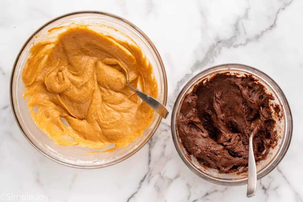 Overhead view of mixing bowls of batter for Pumpkin brownies recipe.