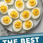 Pinterest graphic for Deviled Eggs recipe. Image is overhead view of platter of Deviled Eggs. Text says, "the best Deviled Eggs simplejoy.com."