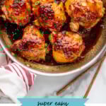 Pinterest graphic for Honey Garlic Chicken Thighs recipe. Image shows skillet of Honey Garlic Chicken Thighs recipe. Text says, "super easy Honey Garlic Chicken simplejouy.com"