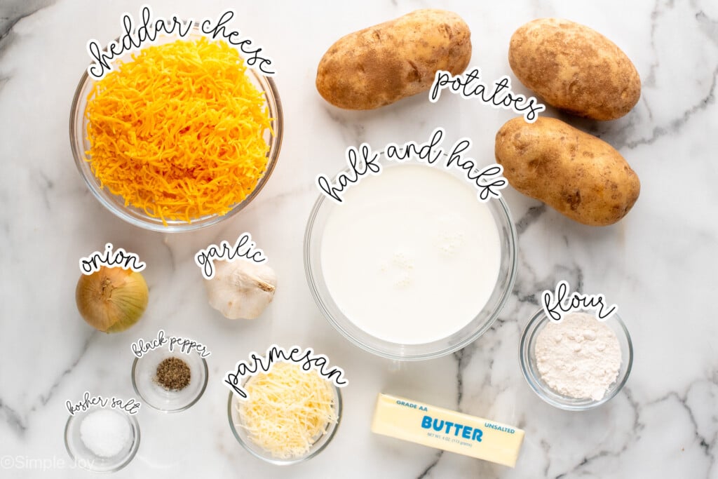 Overhead view of ingredients for Potatoes Au Gratin recipe on countertop. - 4