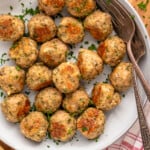 Overhead view of a bowl of Baked Turkey Meatballs with forks - 9