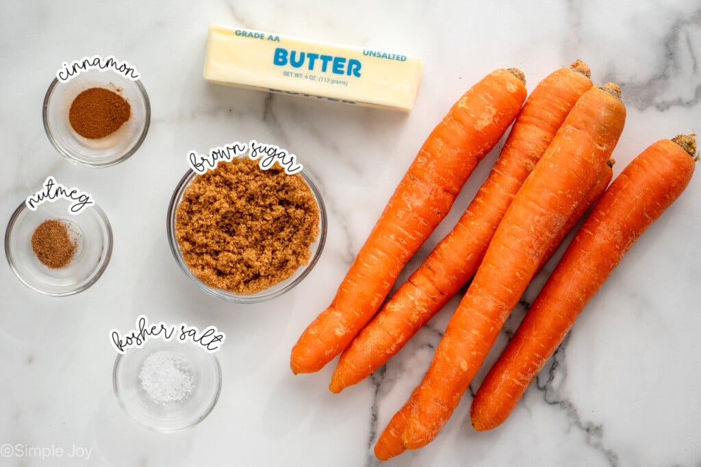 Overhead view of ingredients on countertop for candied carrots recipe. - 5