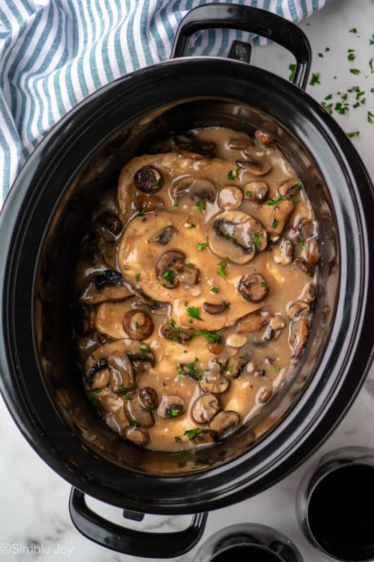 Overhead view of slow cooker with Crock Pot Chicken Marsala recipe