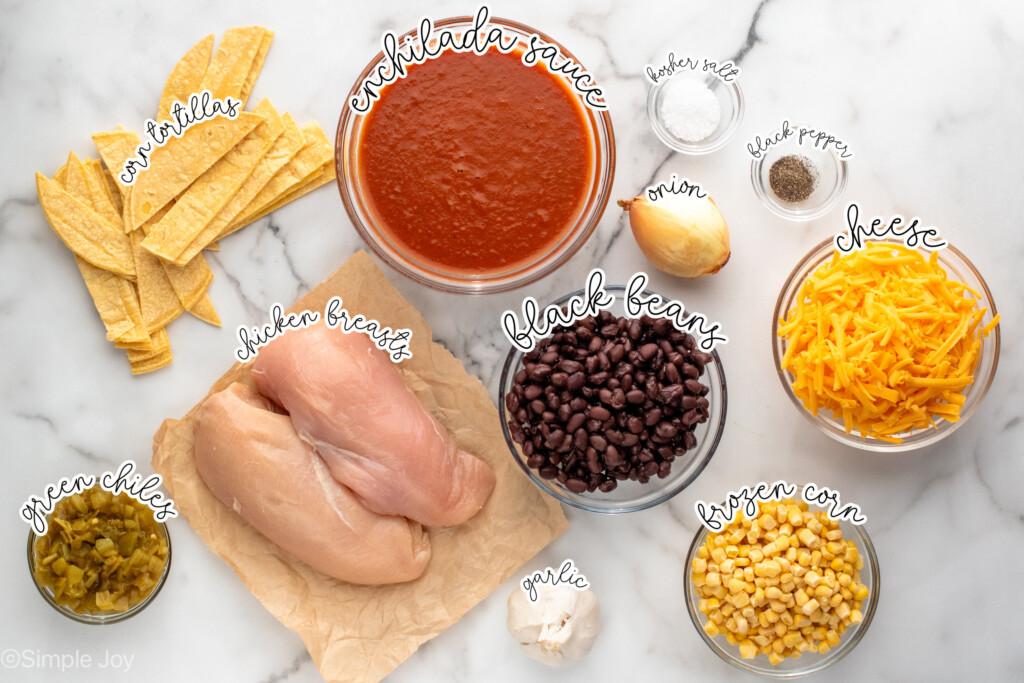 Overhead view of ingredients on countertop for Crockpot Chicken Enchilada Casserole recipe - 4