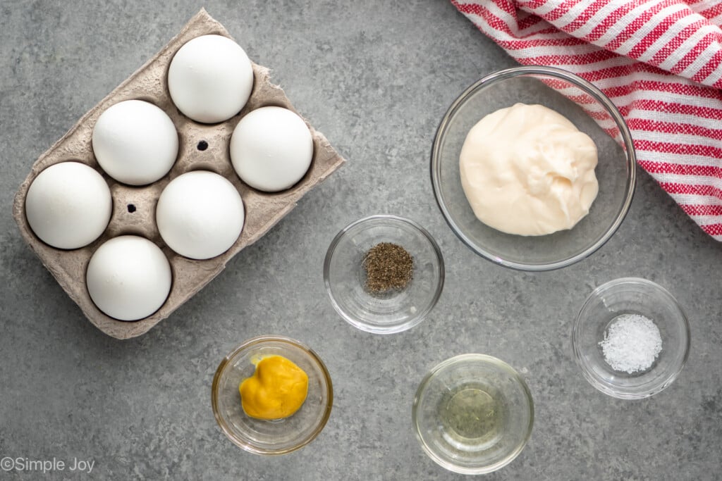 Overhead view of ingredients on countertop for Deviled Eggs recipe. - 5