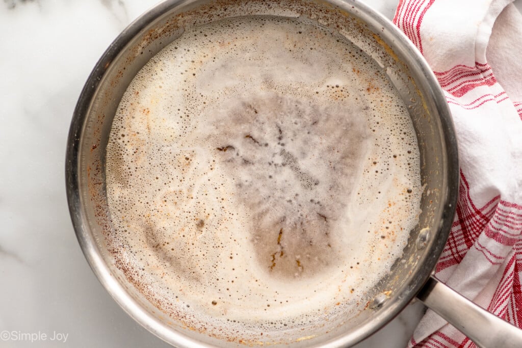 Overhead view of a saucepan of browning butter for Brown Butter Chocolate Chip Cookies recipe - 6
