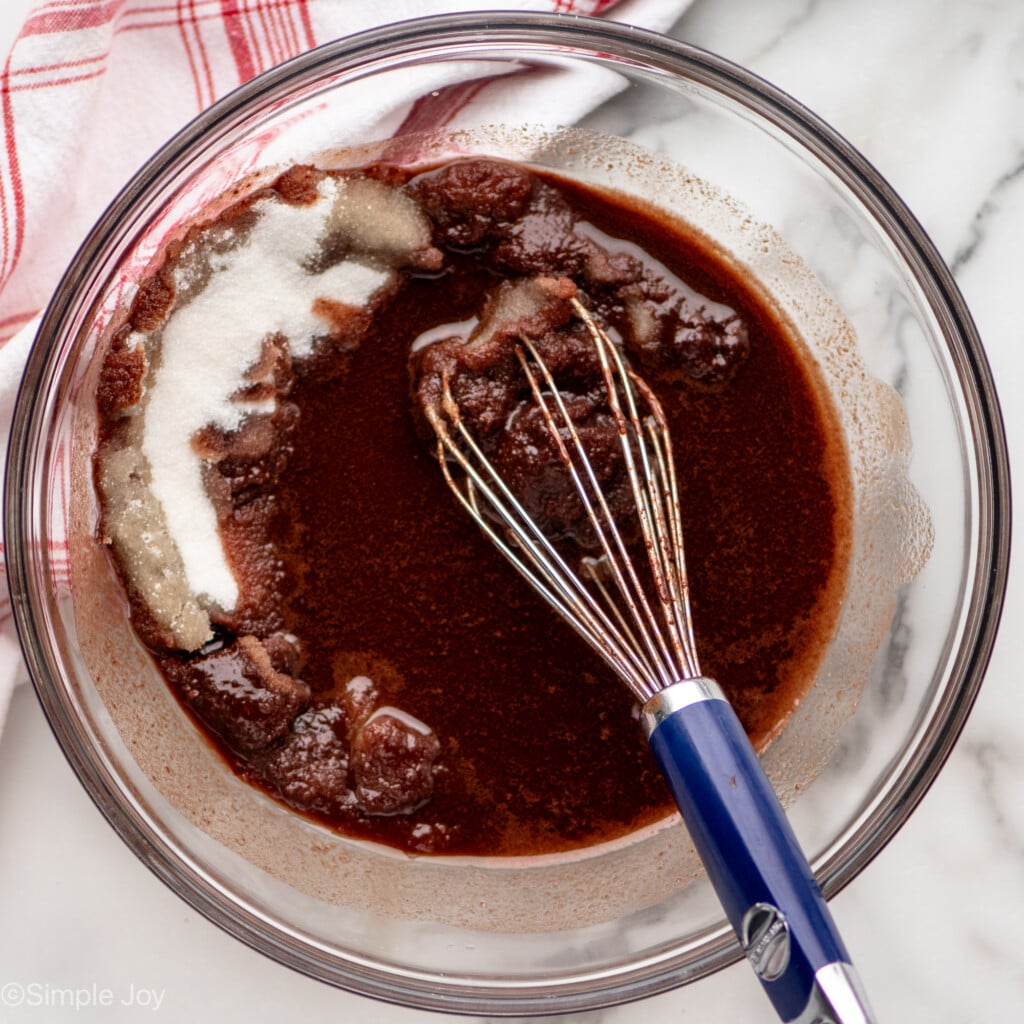 Overhead view of mixing bowl of ingredients and whisk for Fudgy Brownie Recipe - 9
