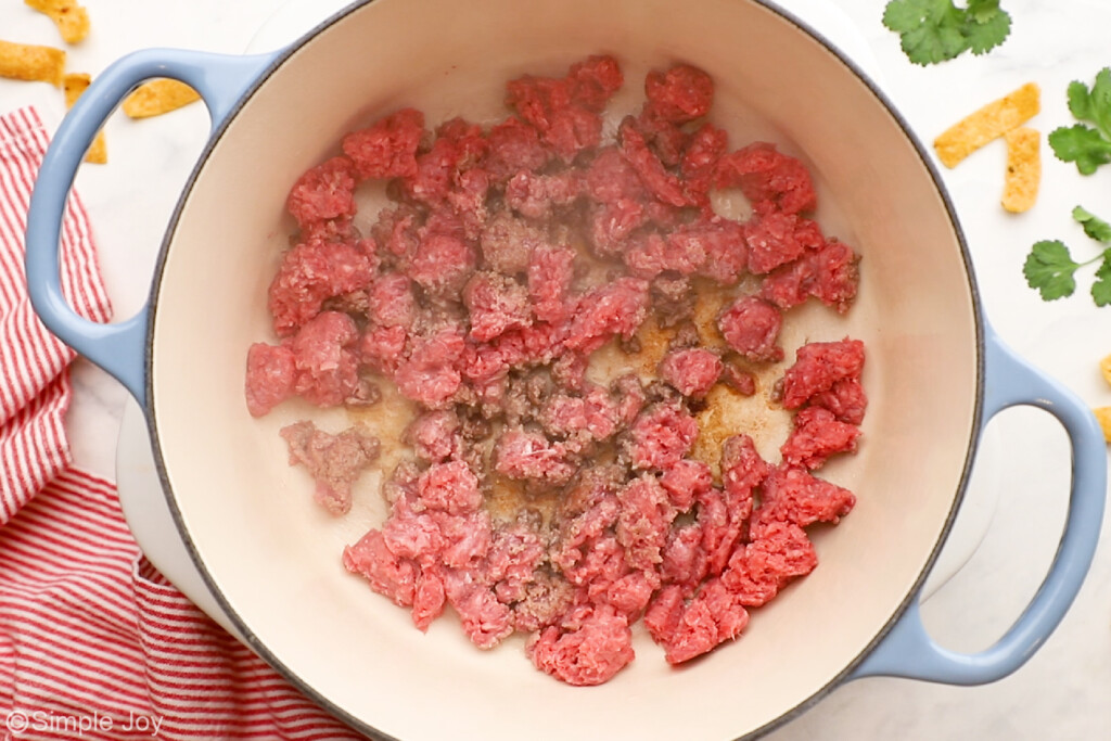 overhead of large pot browning hamburger to make easy chili recipe - 6