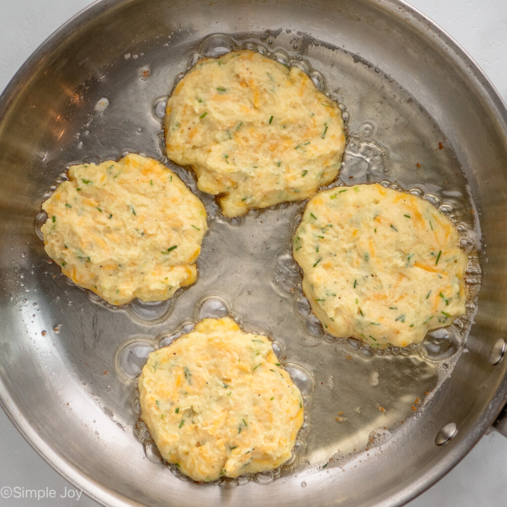 Overhead view of Mashed Potato Pancakes recipe cooking in a skillet - 8