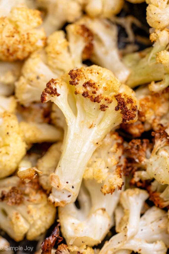 close up of a piece of air fried cauliflower - 9