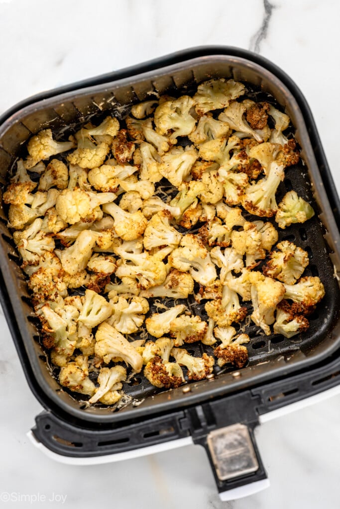 overhead of air fried cauliflower in the basket of the air fryer