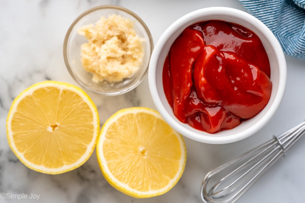 Overhead view of ingredients on countertop for Shrimp Cocktail Sauce with whisk - 3
