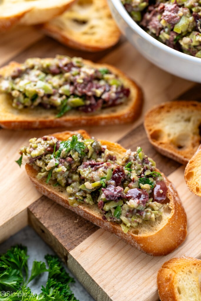 Toasted bread slices topped with Olive Tapenade - 8